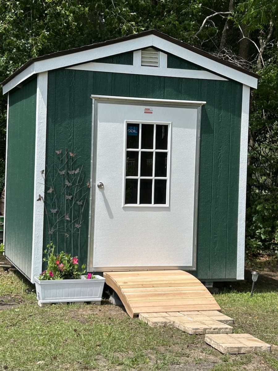 The green Garden Shed seen from the front